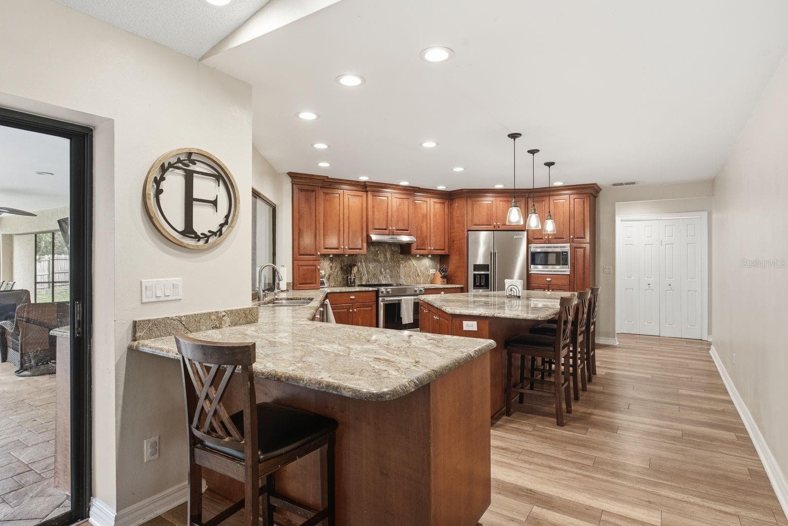 Kitchen from Family Room - 2729 REDFORD CT E, CLEARWATER