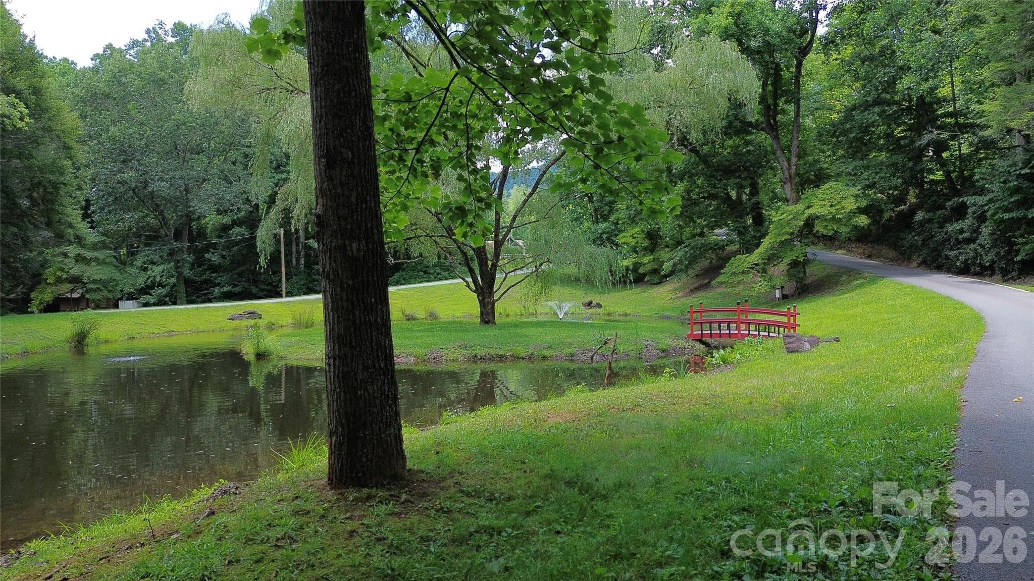 Pond near entrance - 32 Great Aspen Way, Black Mountain