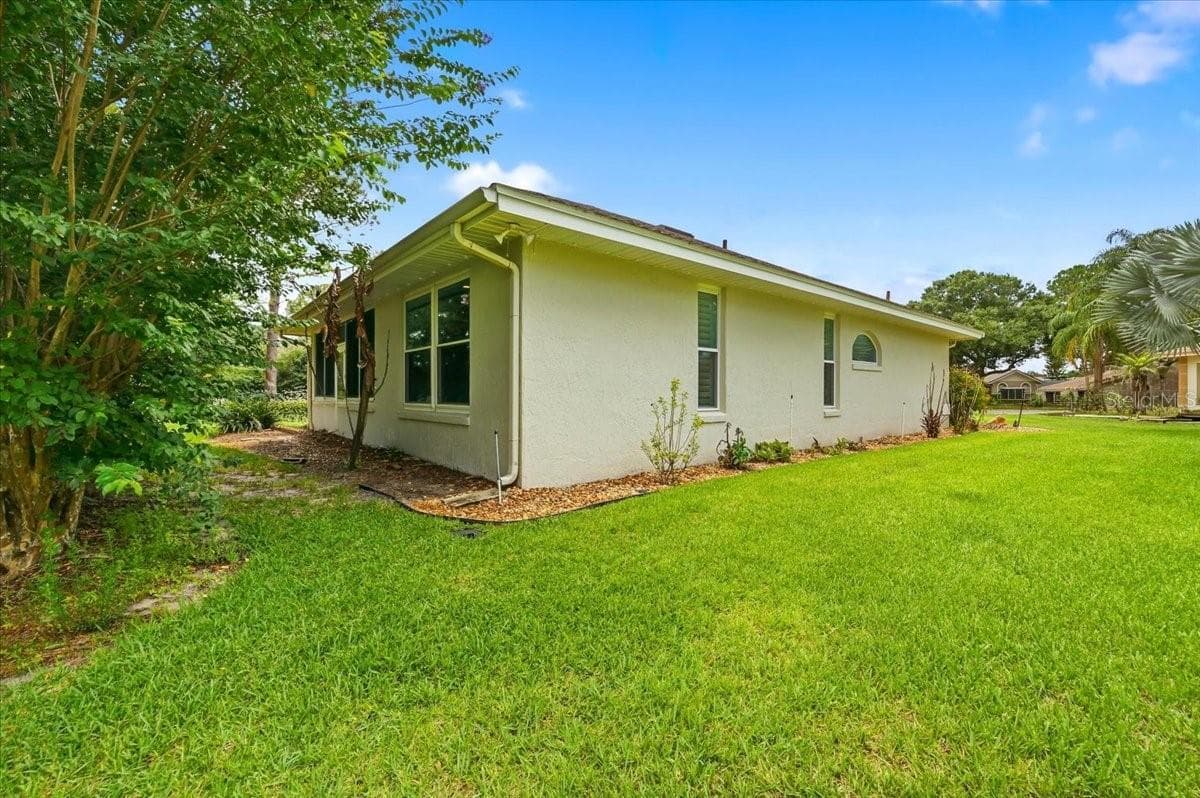 back/side view - 3158 BEAUCHAMP CT, WINTER HAVEN