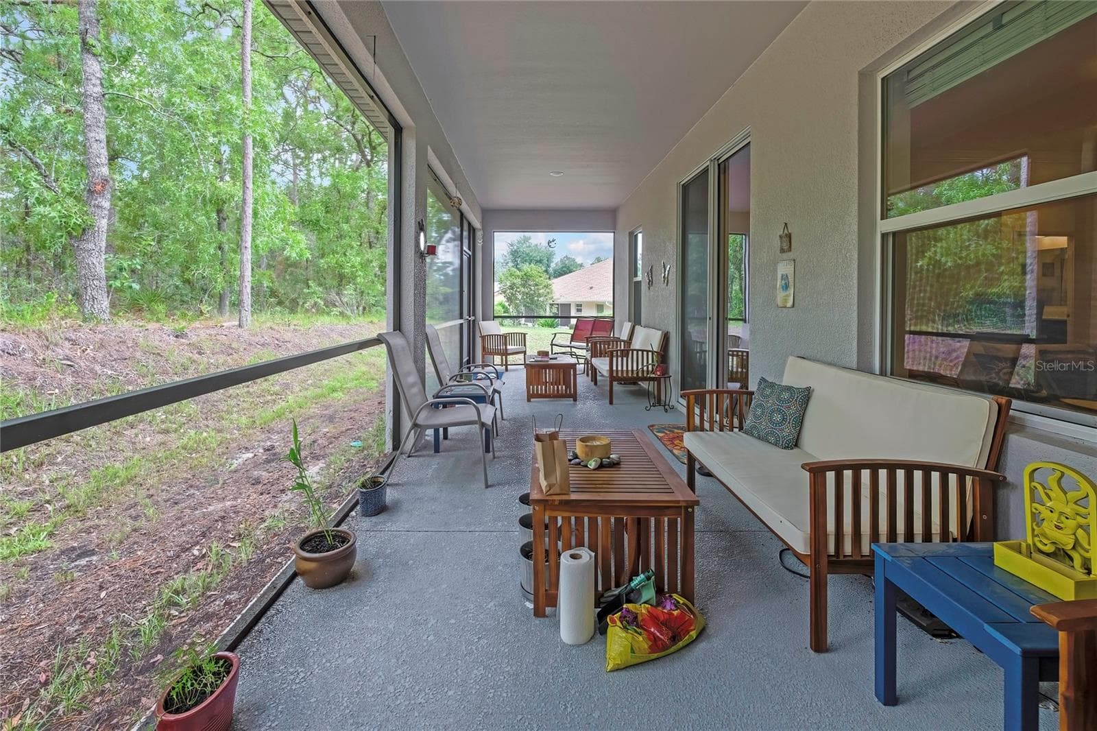 full view of back screened in porch - 32 CARNATION CT, HOMOSASSA