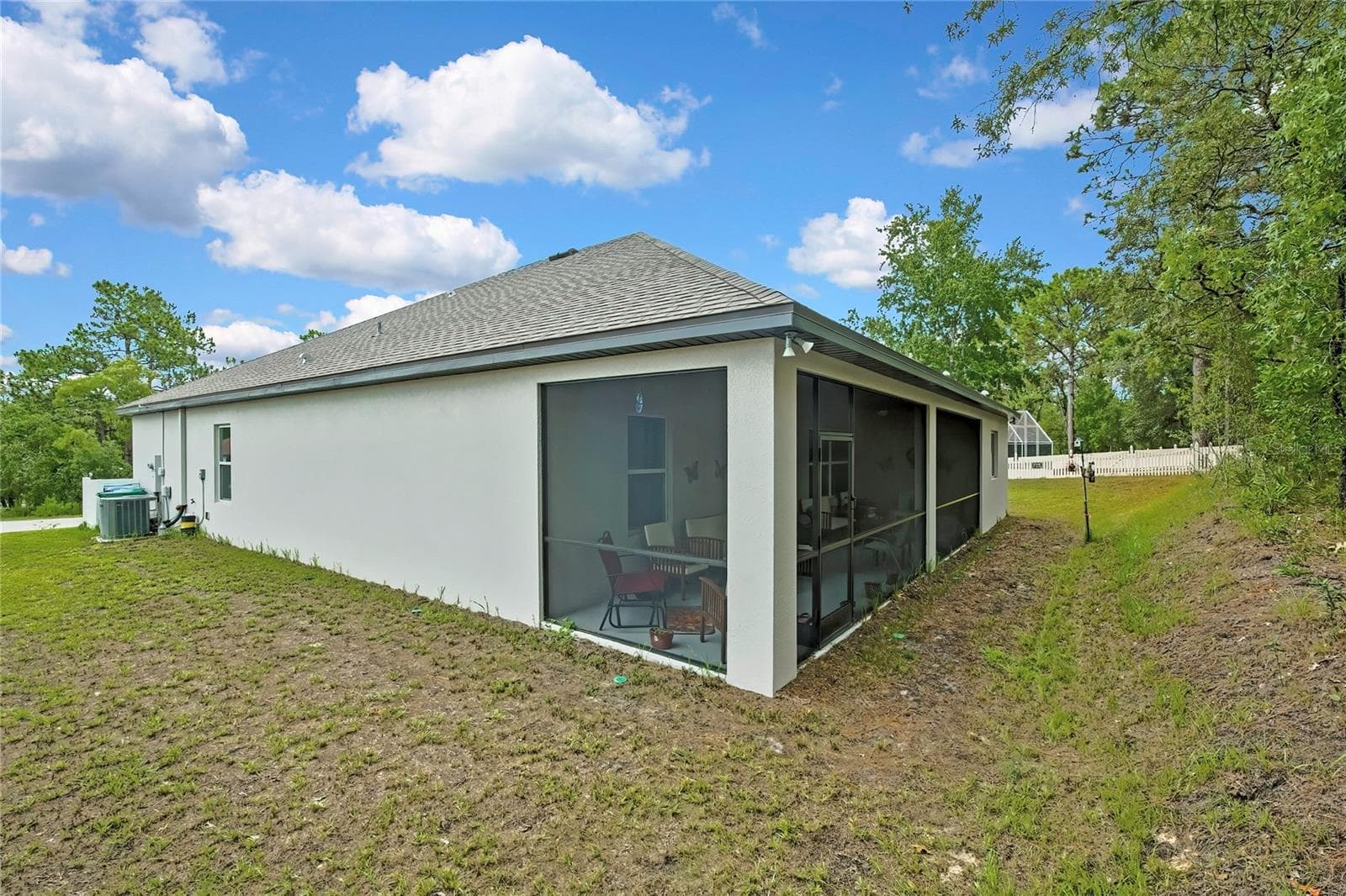 exterior of side yard - 32 CARNATION CT, HOMOSASSA