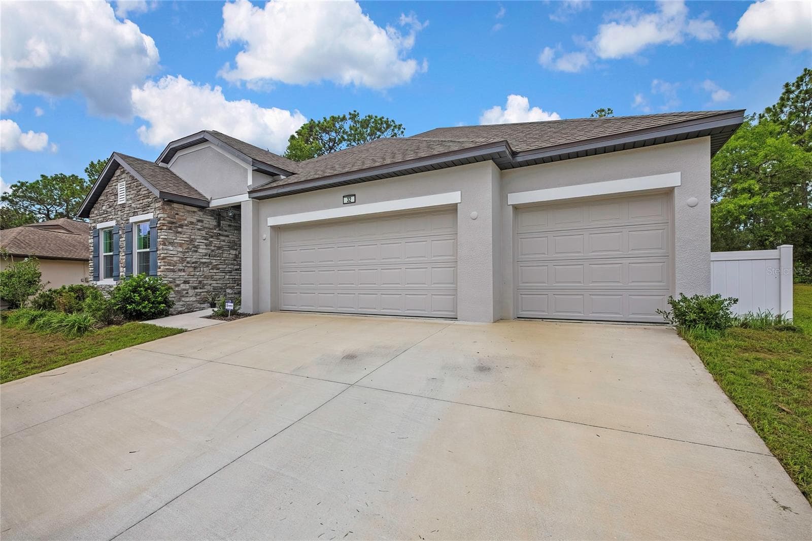 3 car oversized garage - 32 CARNATION CT, HOMOSASSA
