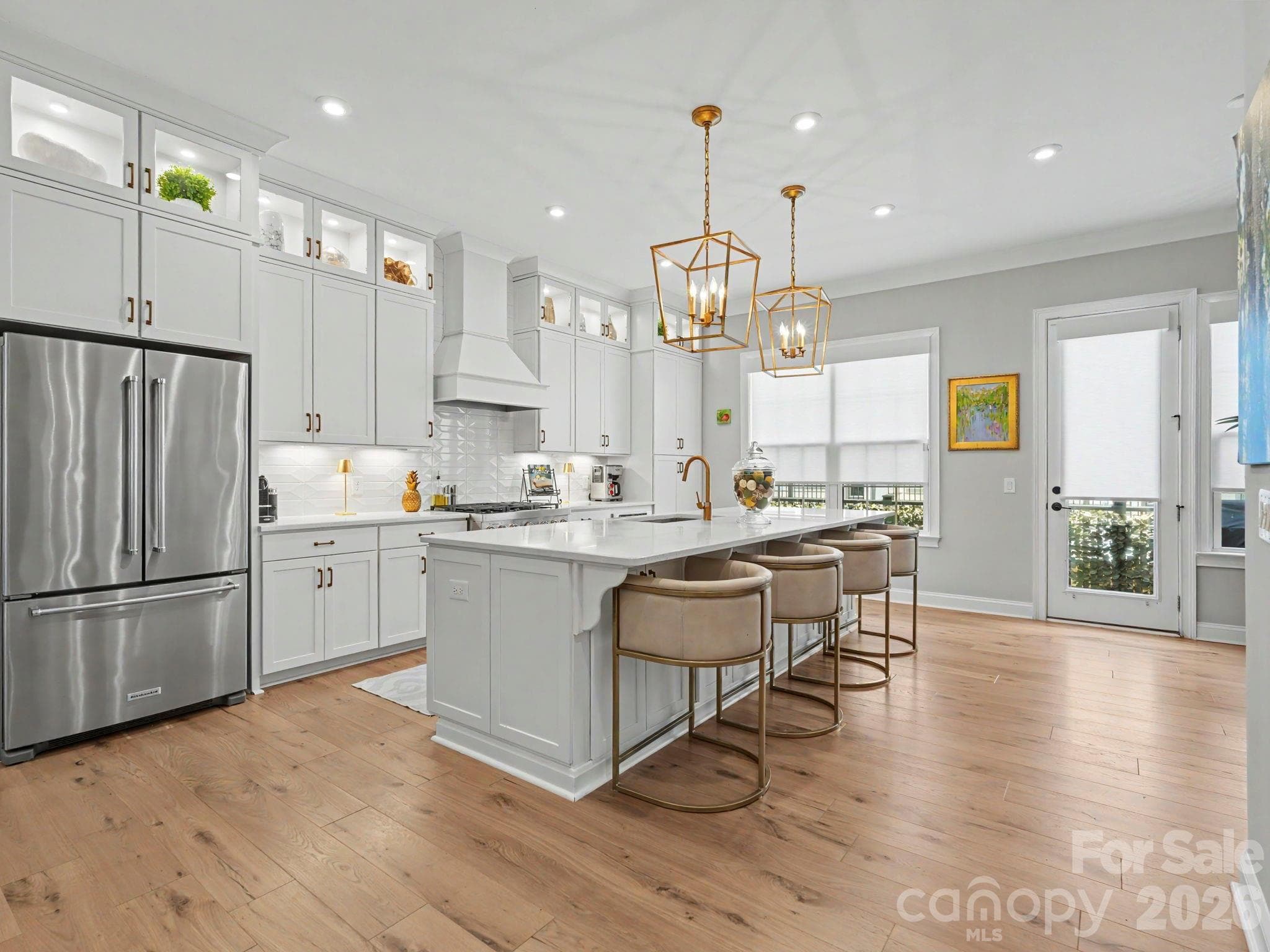 Chef's Kitchen with Glass Cabinets/Puck Lighting, Gold Fixtures and Large Island - 2523 Deacon Avenue, Charlotte