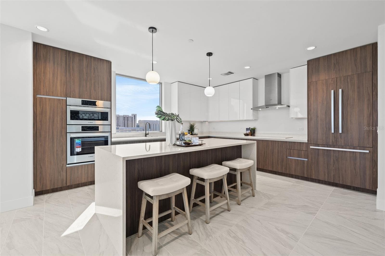 Chef's dream kitchen with walnut Italian cabinetry and quartz countertops - 777 3RD AVE N #805, ST PETERSBURG