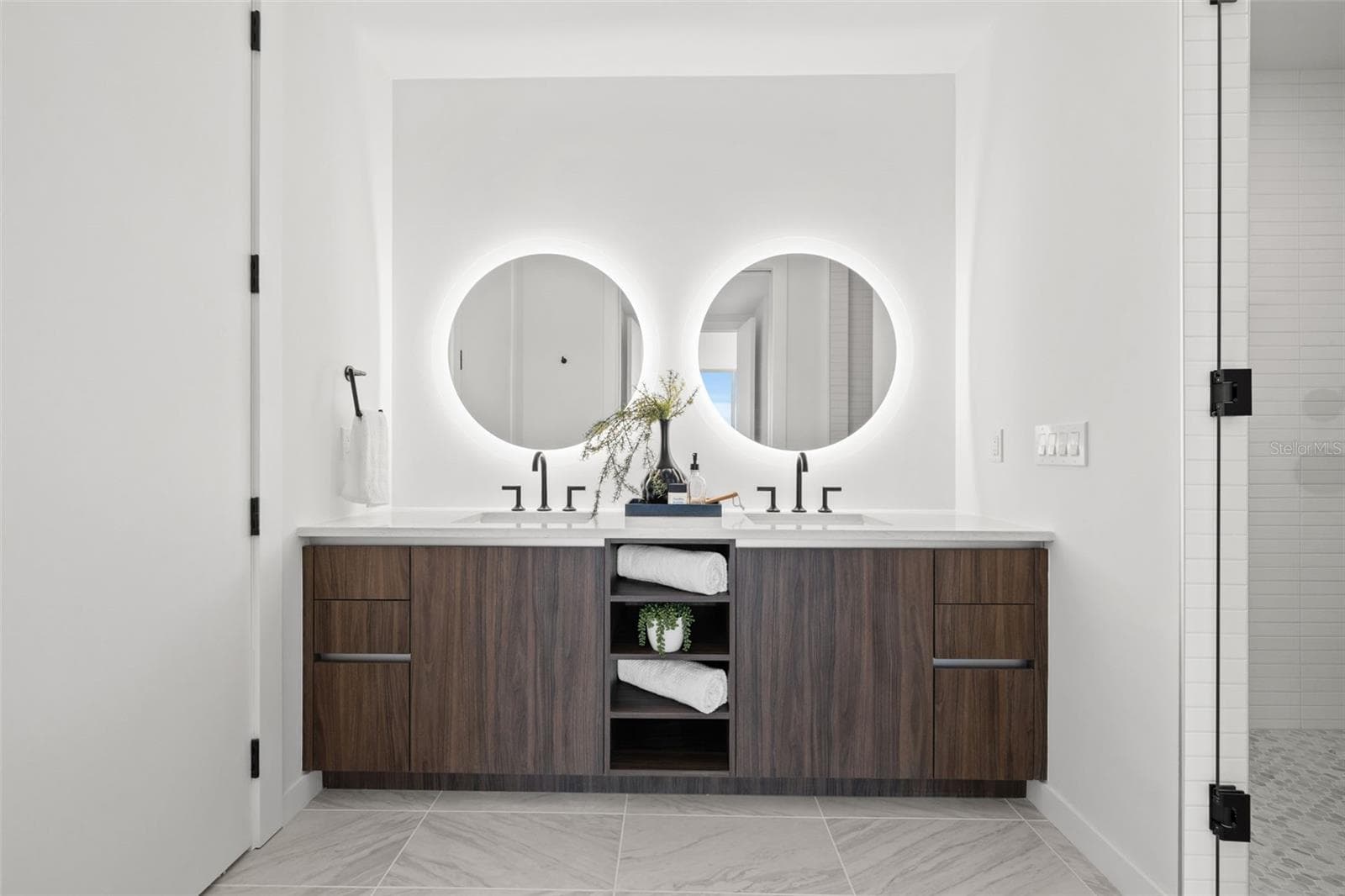Dual vanity with lit mirrors - 777 3RD AVE N #805, ST PETERSBURG