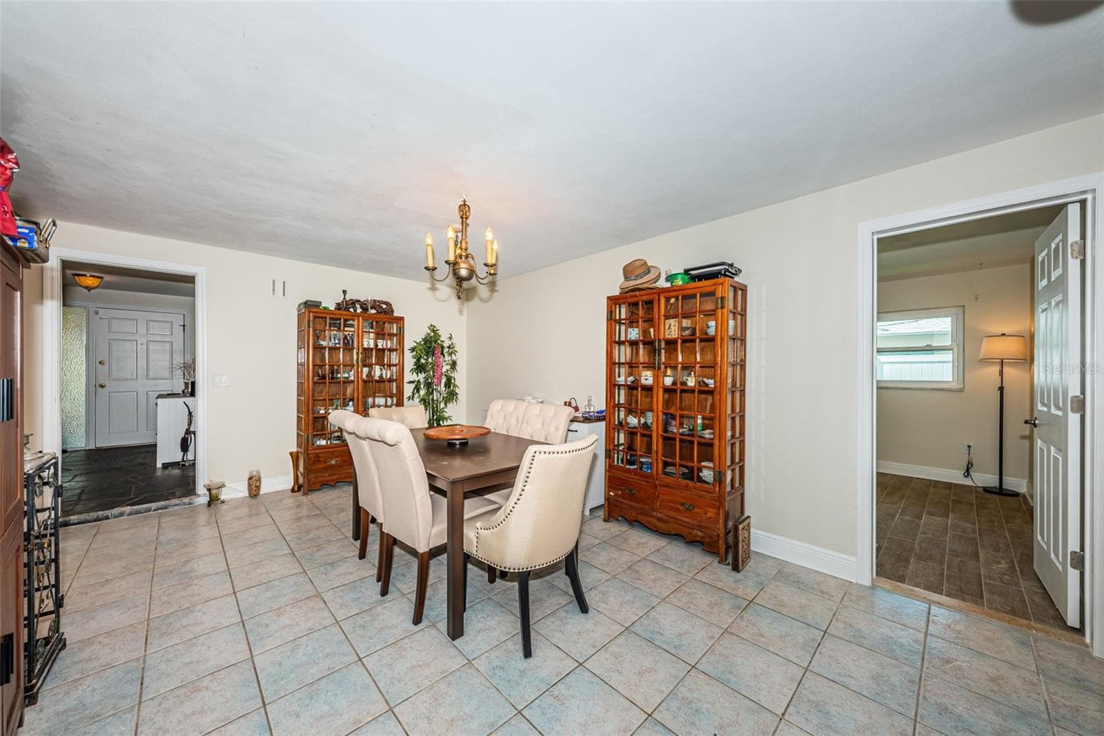 Neutral tile throughout - 5230 VENETIAN BLVD NE, ST PETERSBURG
