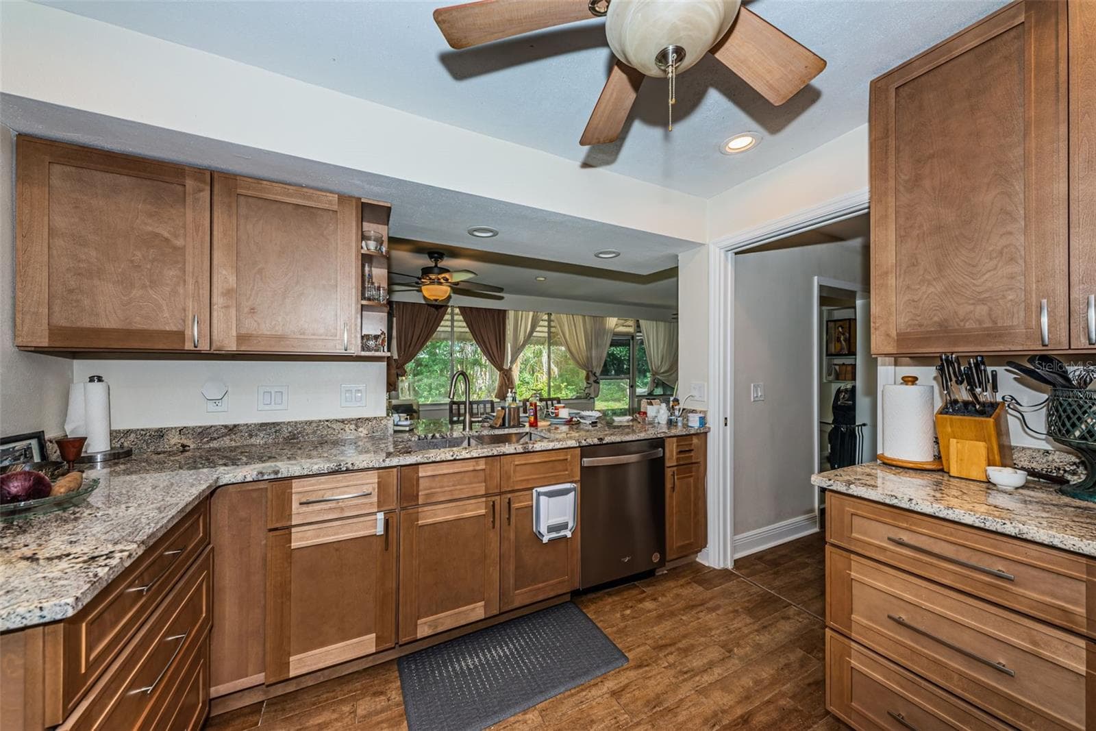 Updated kitchen with soft brown cabinets - 5230 VENETIAN BLVD NE, ST PETERSBURG