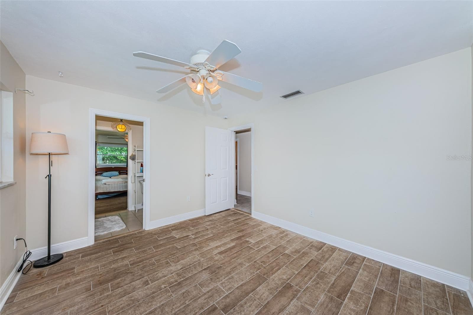 Bedroom 3 with pretty flooring - 5230 VENETIAN BLVD NE, ST PETERSBURG