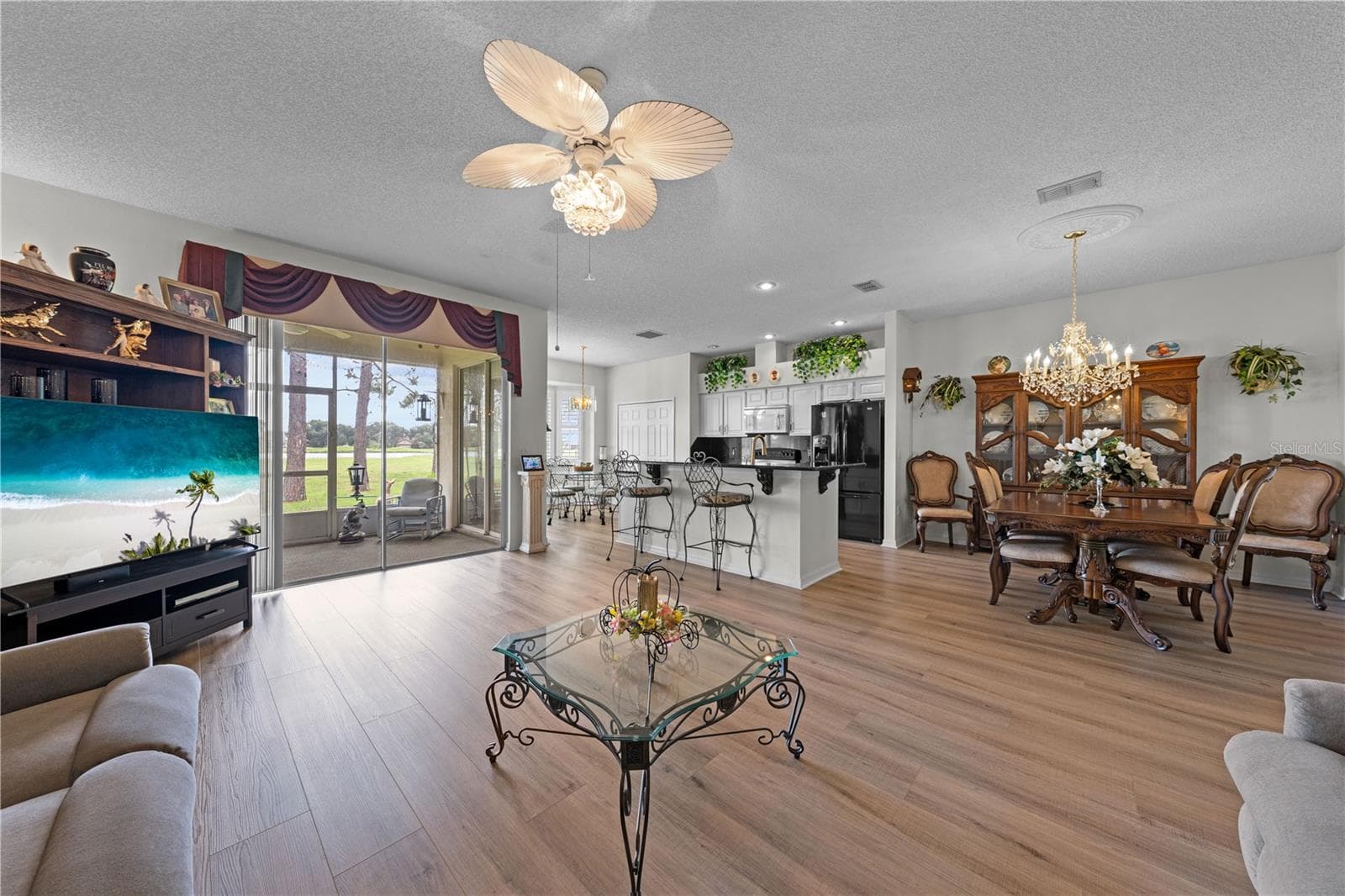 View from the Living room into the updated kitchen - 153 CLUB VILLAS LN, KISSIMMEE