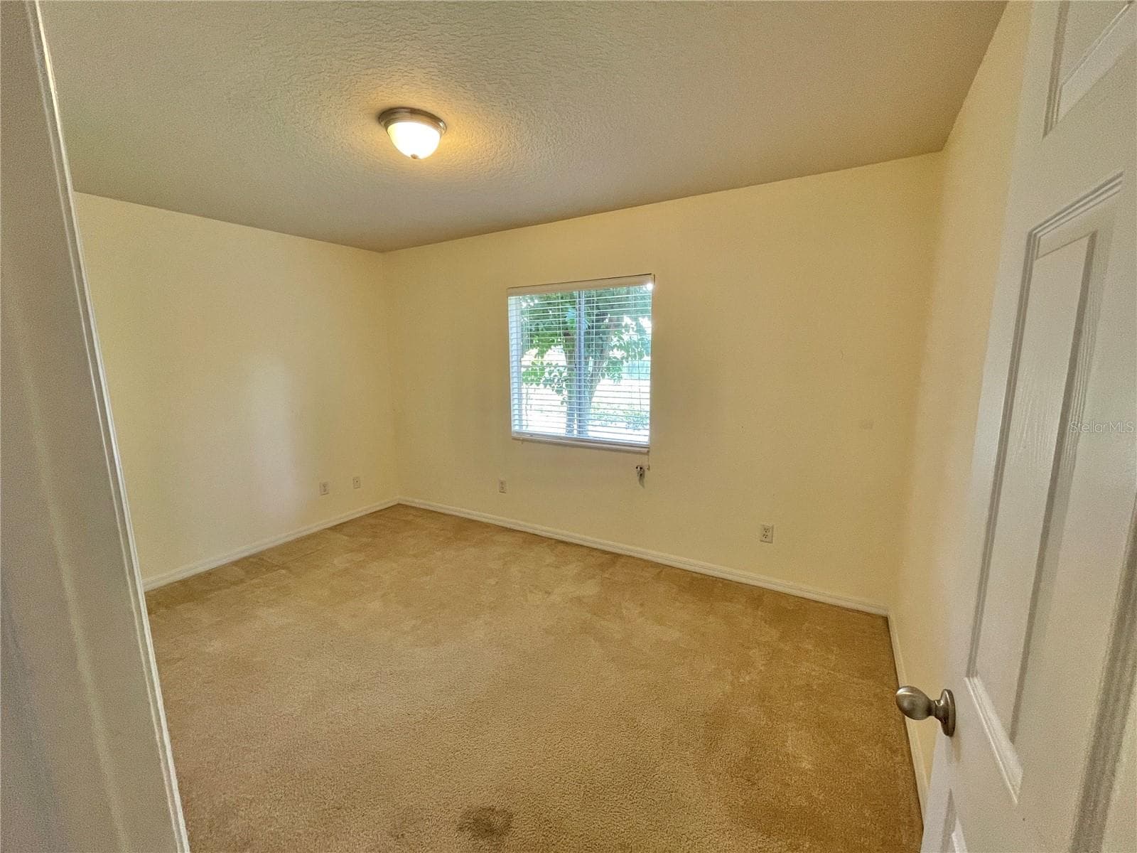 unstaged 2nd bedroom with lakeview - 145 N PEARL LAKE CSWY #112, ALTAMONTE SPRINGS
