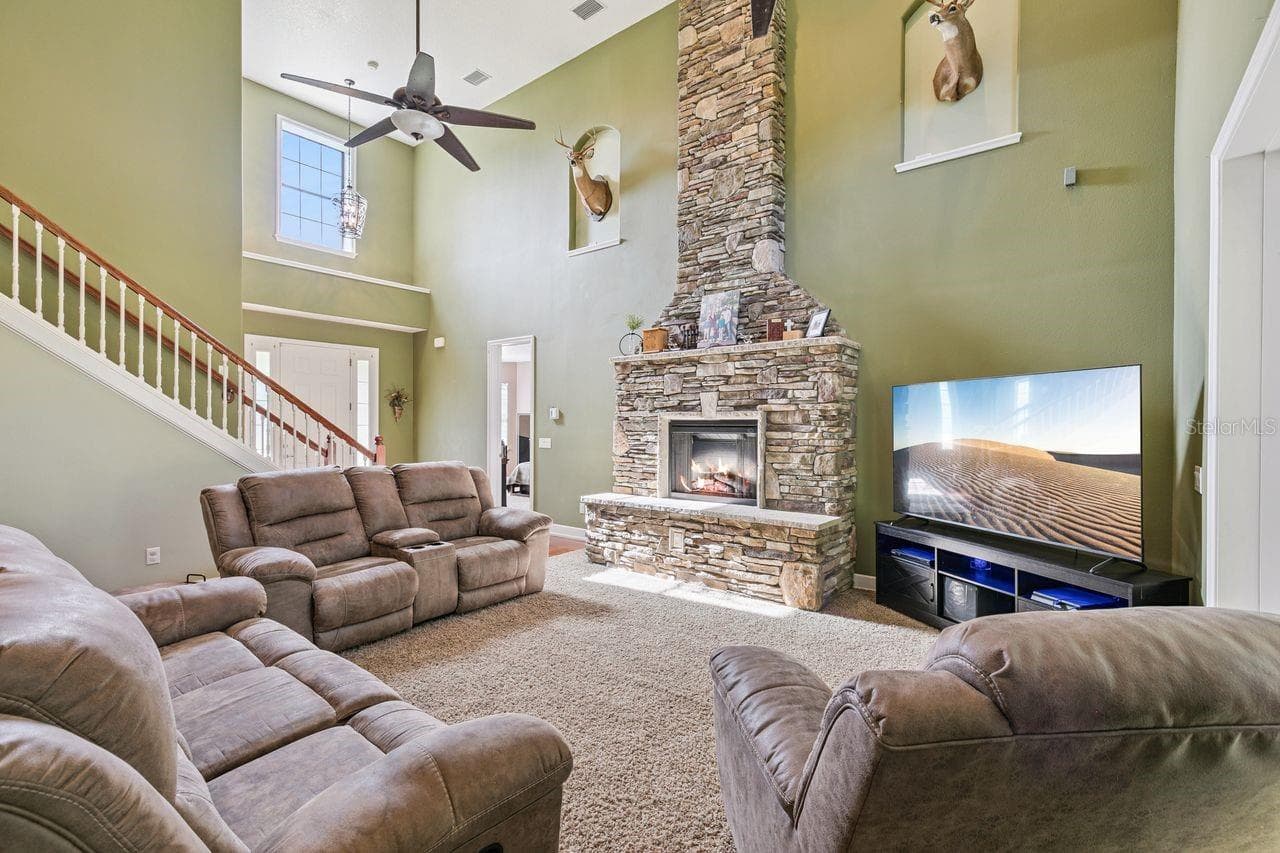 Living Room with Fireplace - 36137 MATTAWAN DR, EUSTIS