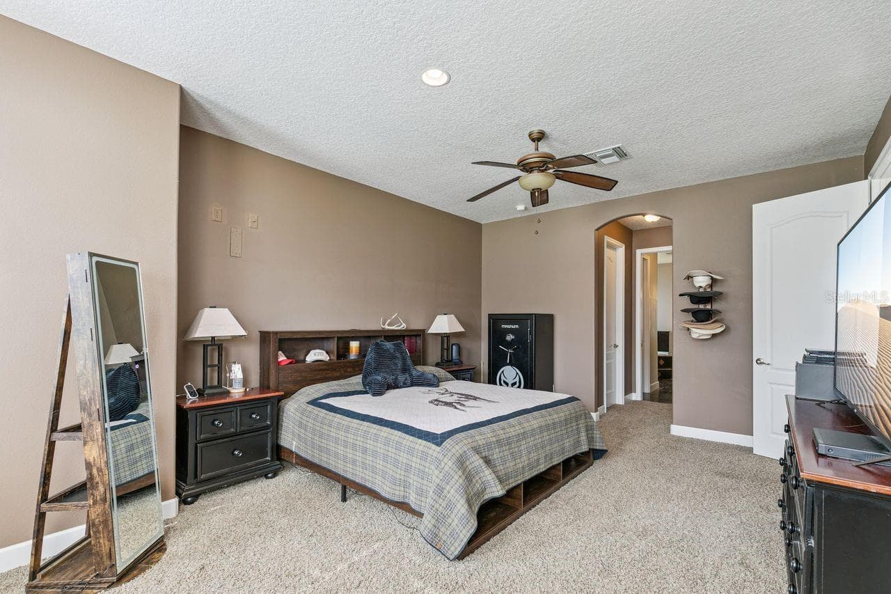 Primary Bedroom on First Floor with two Walk-In Closets - 36137 MATTAWAN DR, EUSTIS
