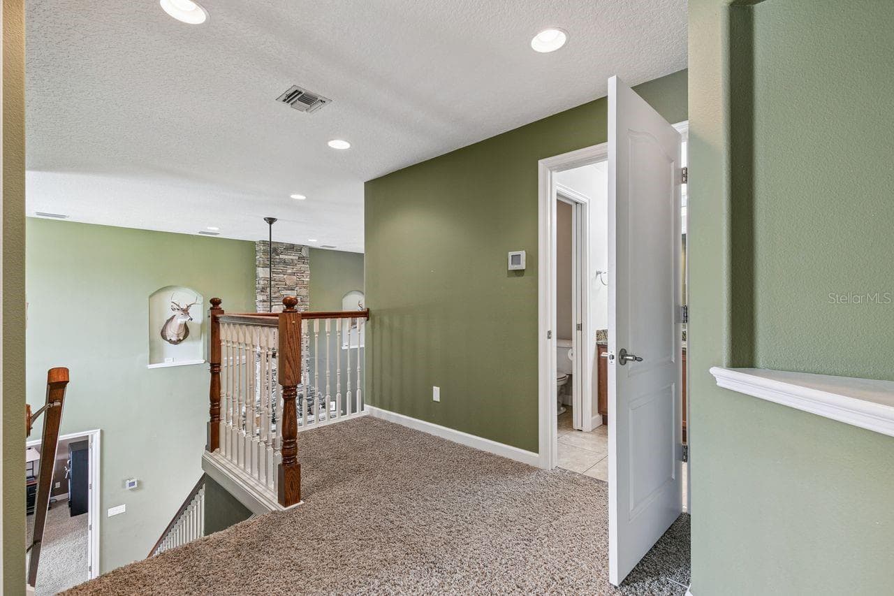 Second Floor Landing with access to the Guest Bathroom on 2nd Floor - 36137 MATTAWAN DR, EUSTIS