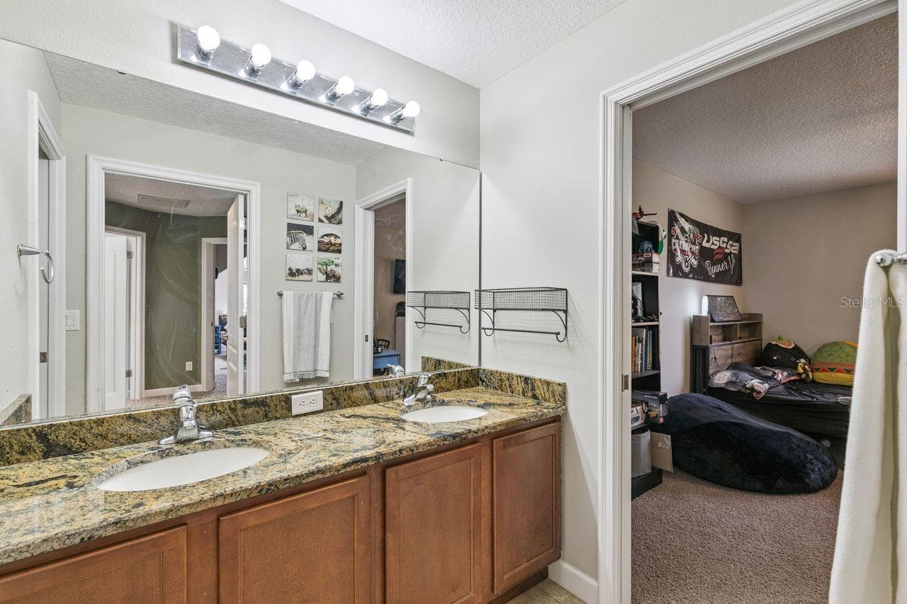 Full Bathroom on Second Floor that services three Bedrooms - 36137 MATTAWAN DR, EUSTIS