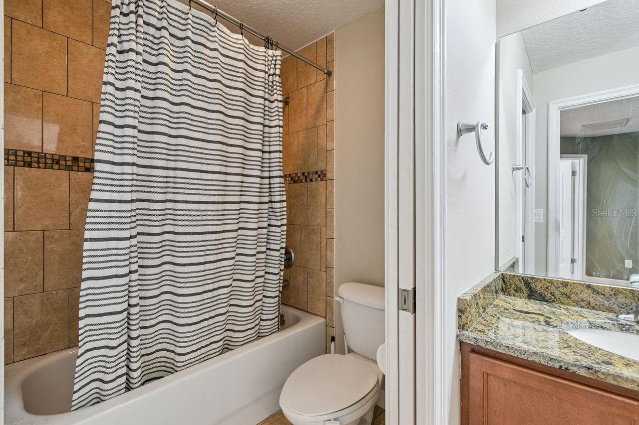 Full Bathroom on Second Floor that services three Bedrooms - 36137 MATTAWAN DR, EUSTIS