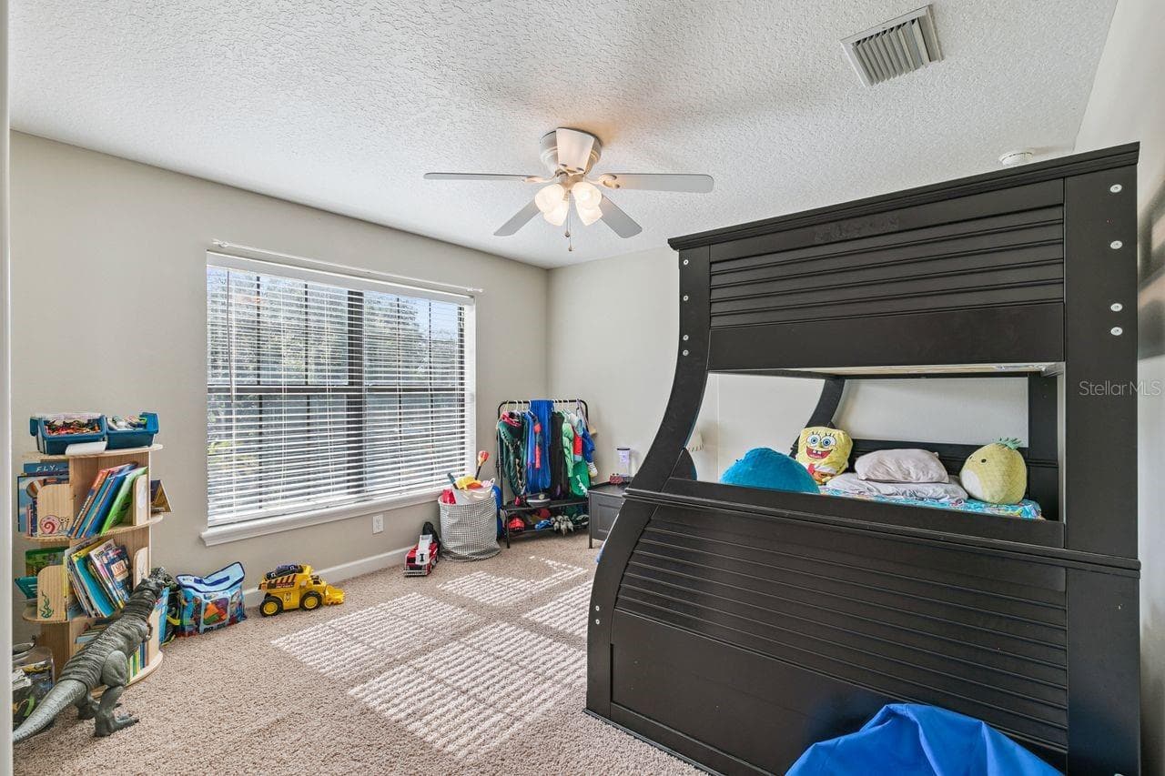 Fifth Bedroom on Second Floor with Walk-In Closet - 36137 MATTAWAN DR, EUSTIS