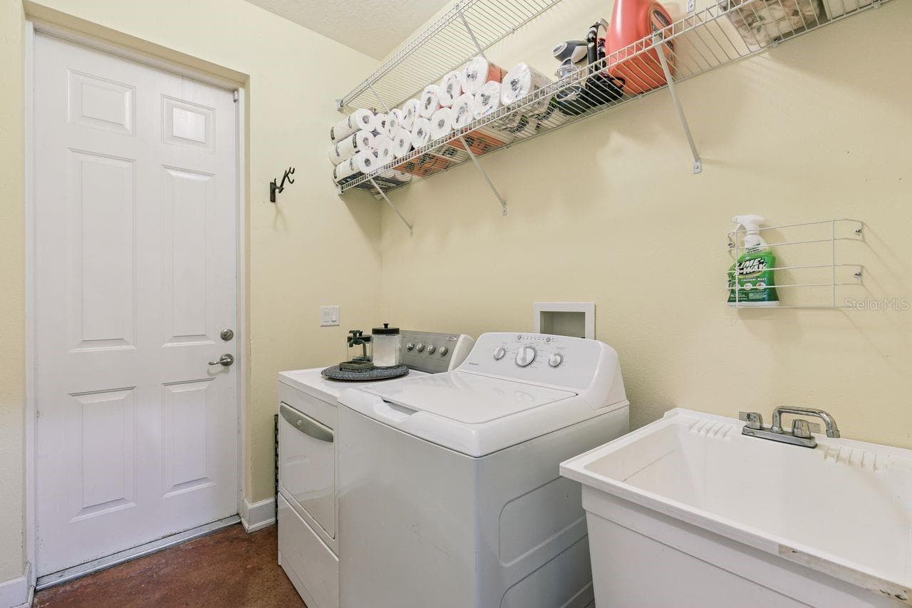 Laundry Room with Access to the Side Entry Yard - 36137 MATTAWAN DR, EUSTIS