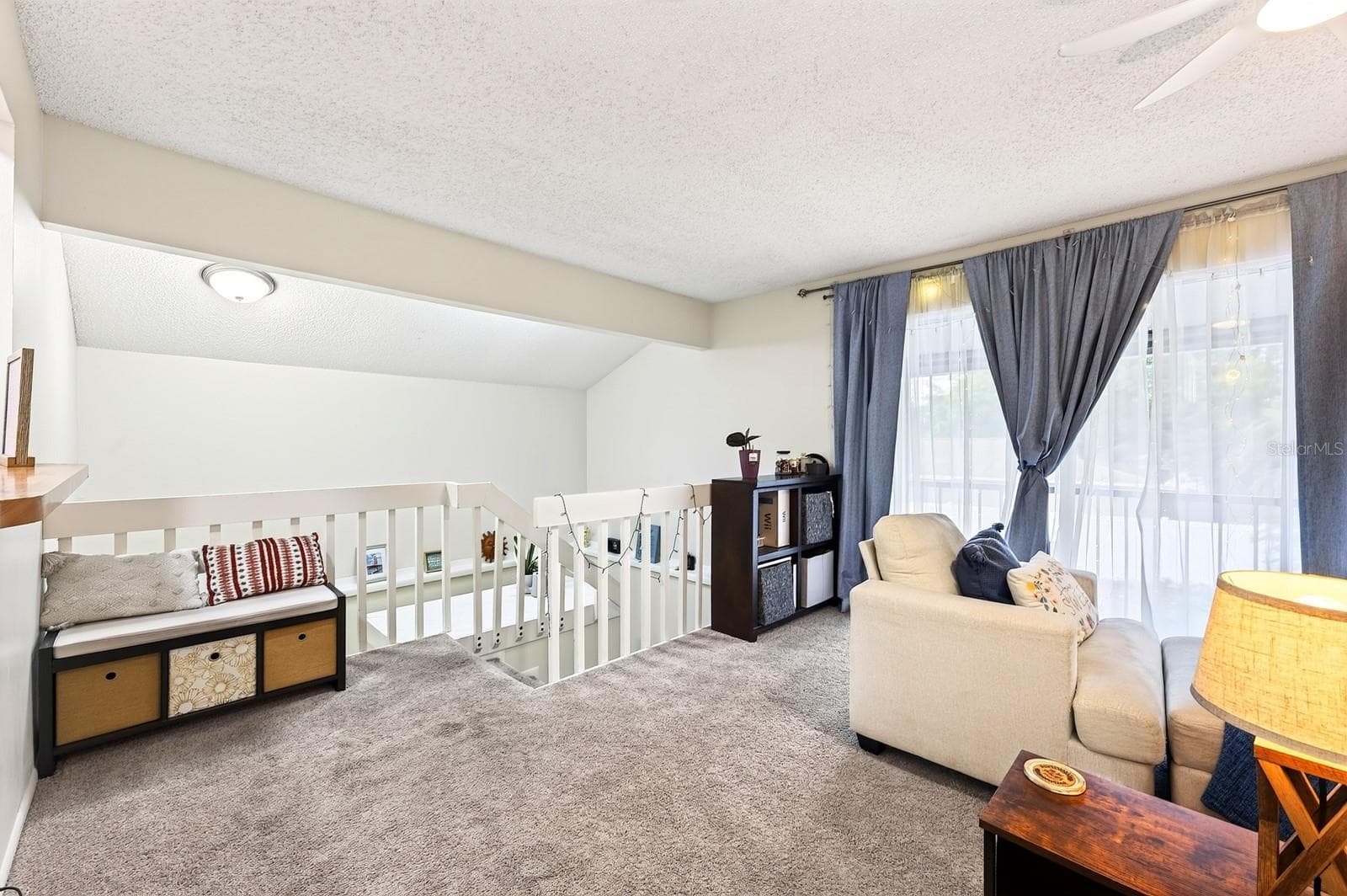 A light bright living space awaits at the top of the stairs from the foyer. - 4607 RING NECK RD #36C, ORLANDO