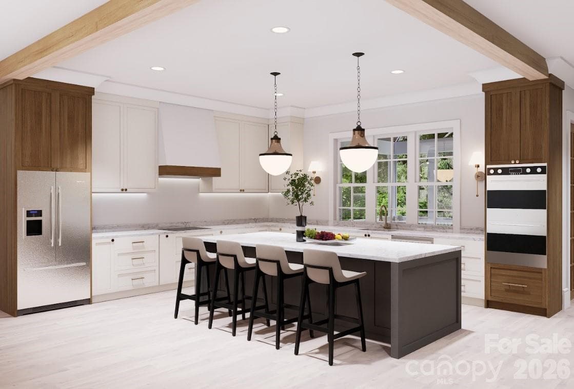 Please note: The builder has revised the kitchen layout. The refrigerator will be located in the space shown for the ovens in the rendering, and the double ovens will be relocated to the space shown for the refrigerator. - 104 Sherwood Drive, Huntersville