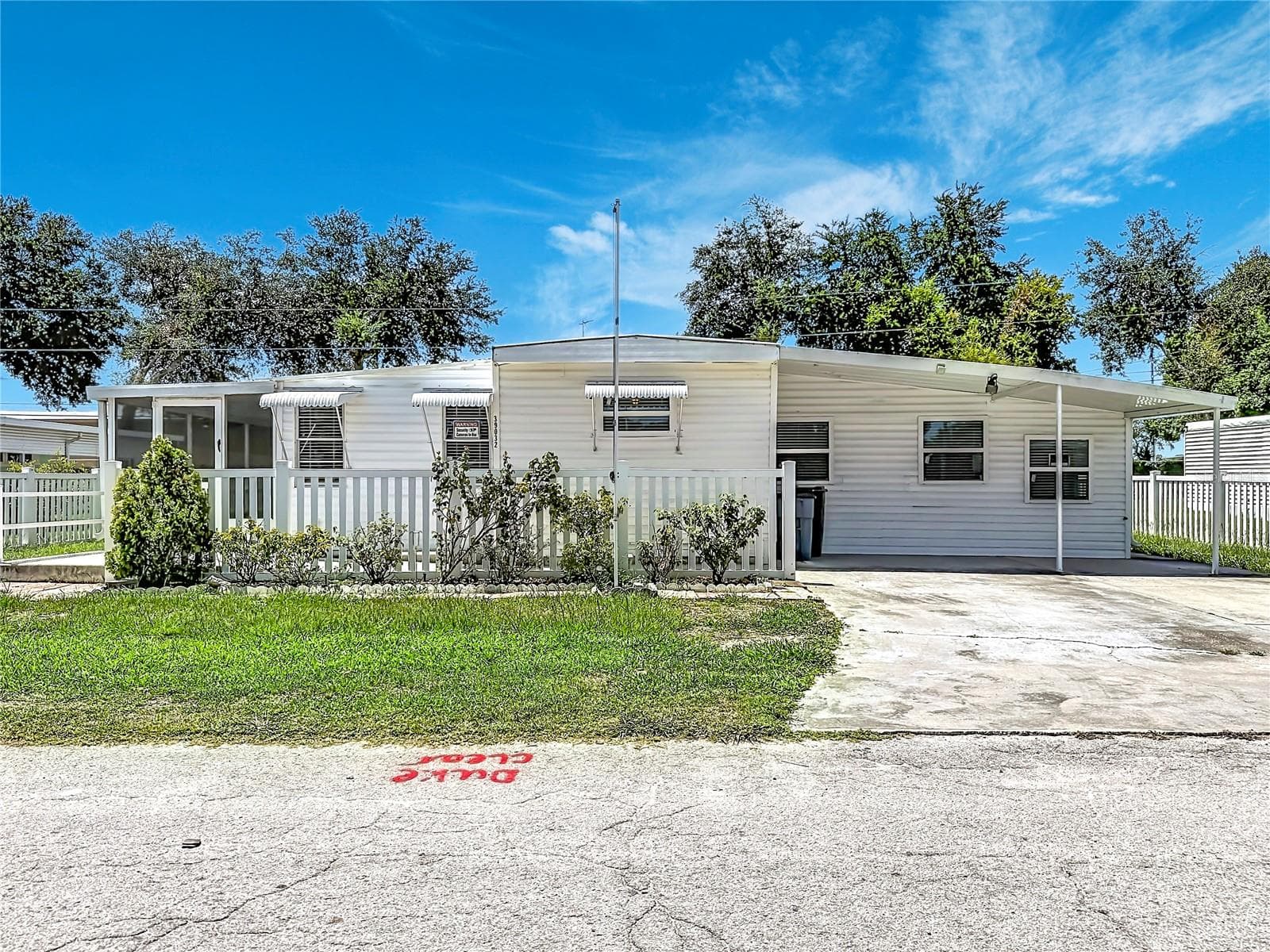 Front of Home - 39032 OLA AVE, ZEPHYRHILLS