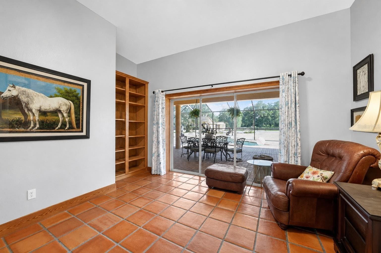 Living Room with Built in Bookshelves - 11105 W HIGHWAY 326, OCALA