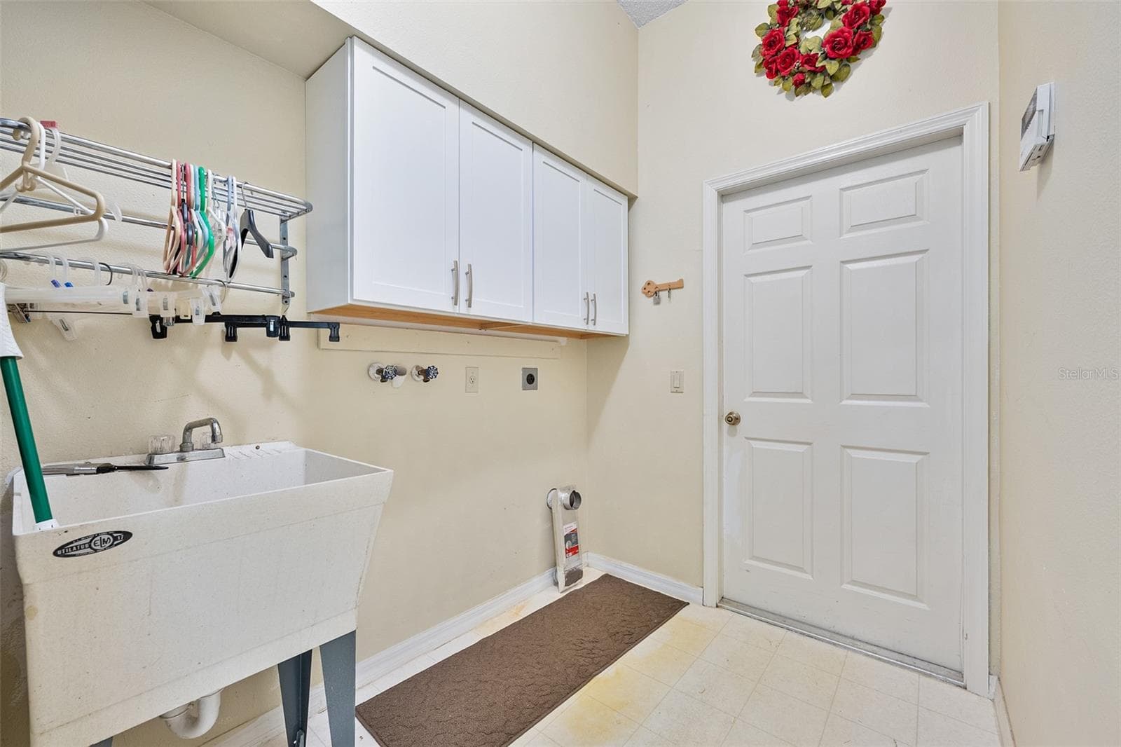 Inside laundry with sink - 1837 E GLANCY DR, DELTONA