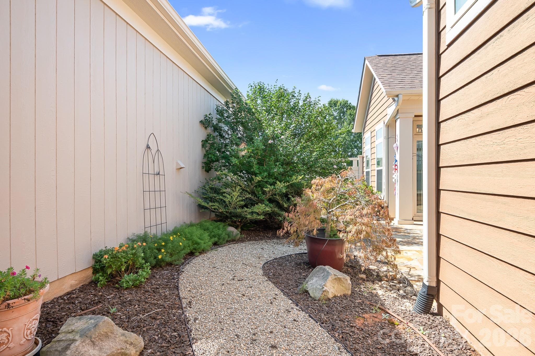 Walkway from front to private courtyard - 127 Brawley Point Circle, Mooresville