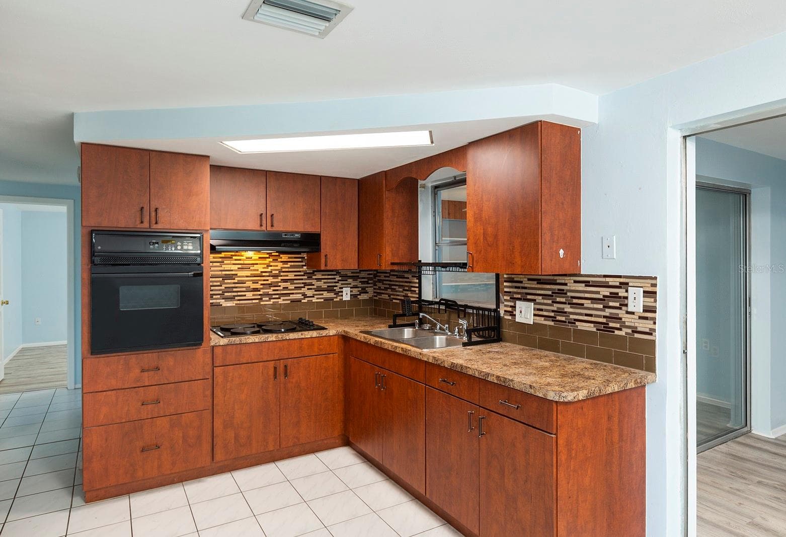 Single Family Residence at 3128 KILBURN RD, HOLIDAY, photo 6 of 23