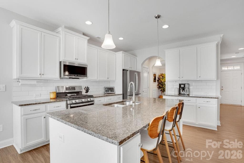 Kitchen Island with seating - 3332 Katherine Taylor Court, Monroe