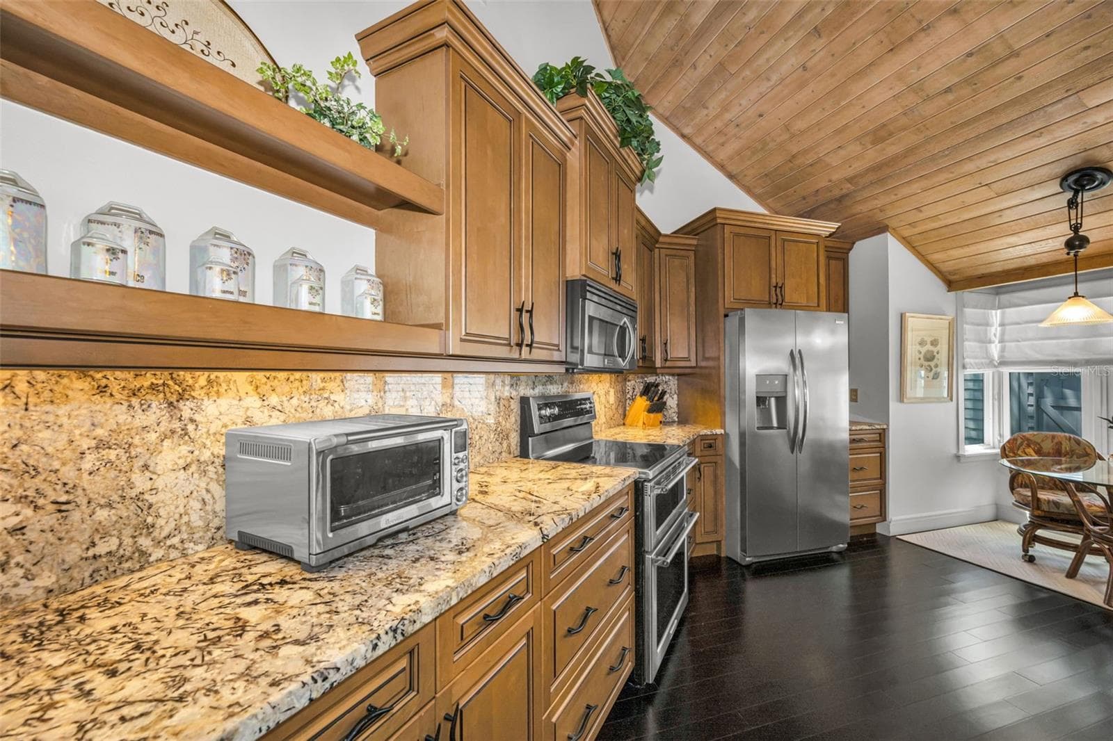 Plus the eat in kitchen makes mornings an easy and special start to the day! - 10497 LONGWOOD DR, SEMINOLE