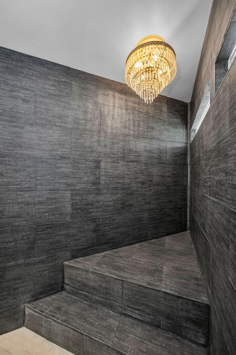 The shower seat, so great for a relaxing! - 10497 LONGWOOD DR, SEMINOLE