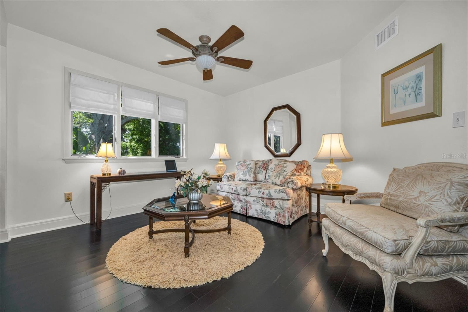 Sitting room has a great view of the back garden - 10497 LONGWOOD DR, SEMINOLE