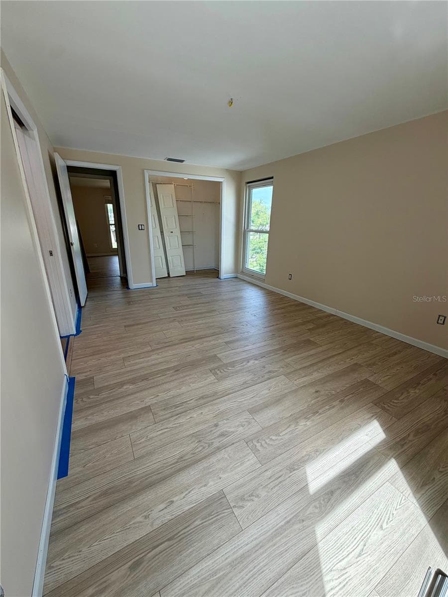 Master bedroom with first closet - 15705 CASHMERE LN, TAMPA
