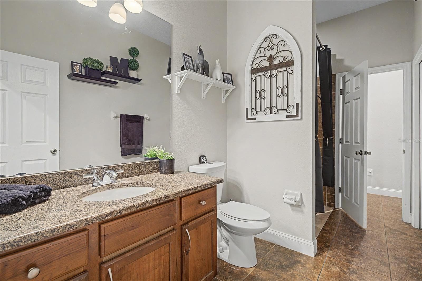 Downstairs bath with full shower - 3038 MARBLE CREST DR, LAND O LAKES