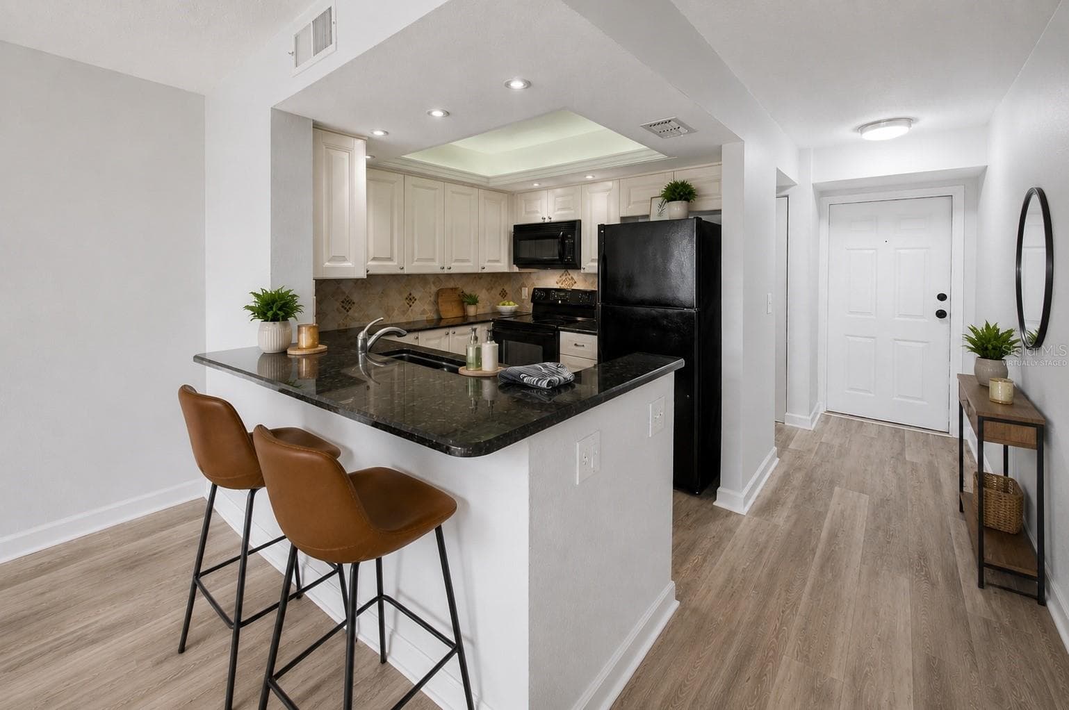 This photo has been virtually staged - 800 COVE CAY DR #5G, CLEARWATER
