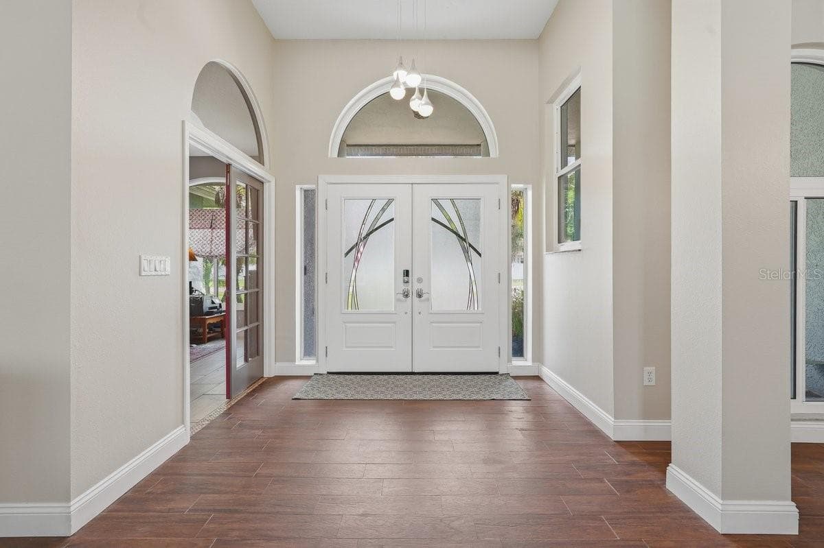 Foyer that opens to the dining room and front living room. - 17024 WINNERS CIR, ODESSA