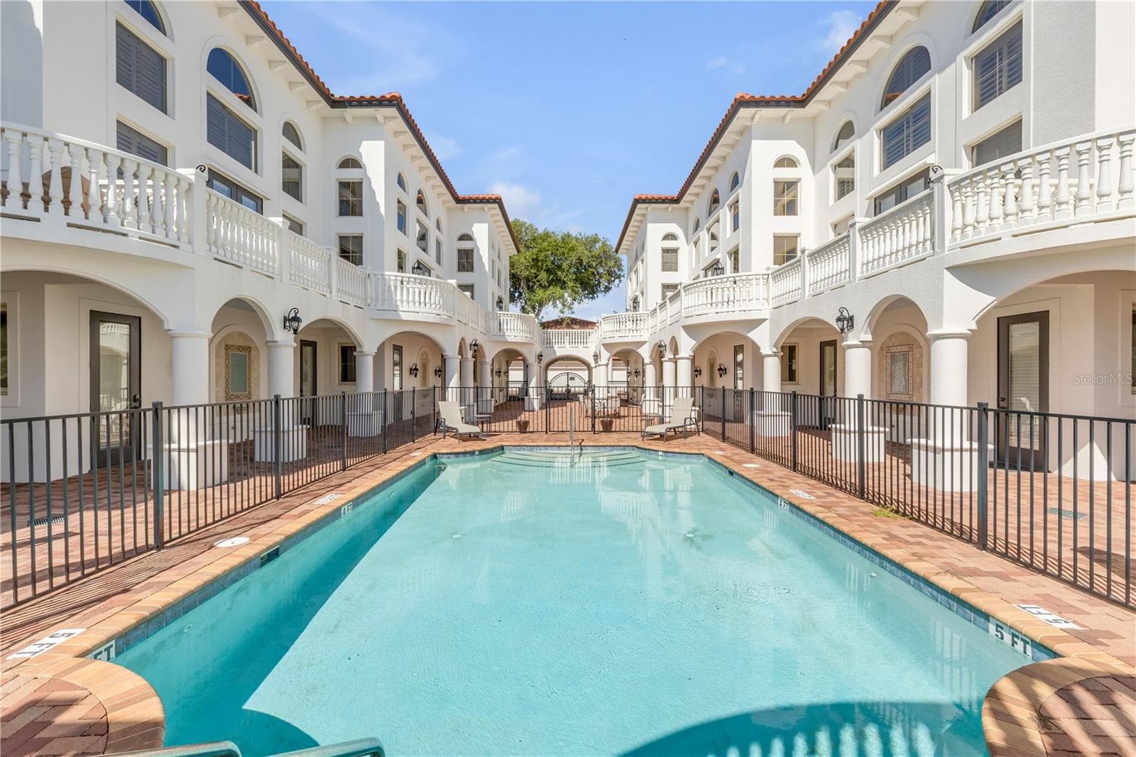 pool looking toward the west - 5090 RIVERSIDE DR #105, PORT ORANGE
