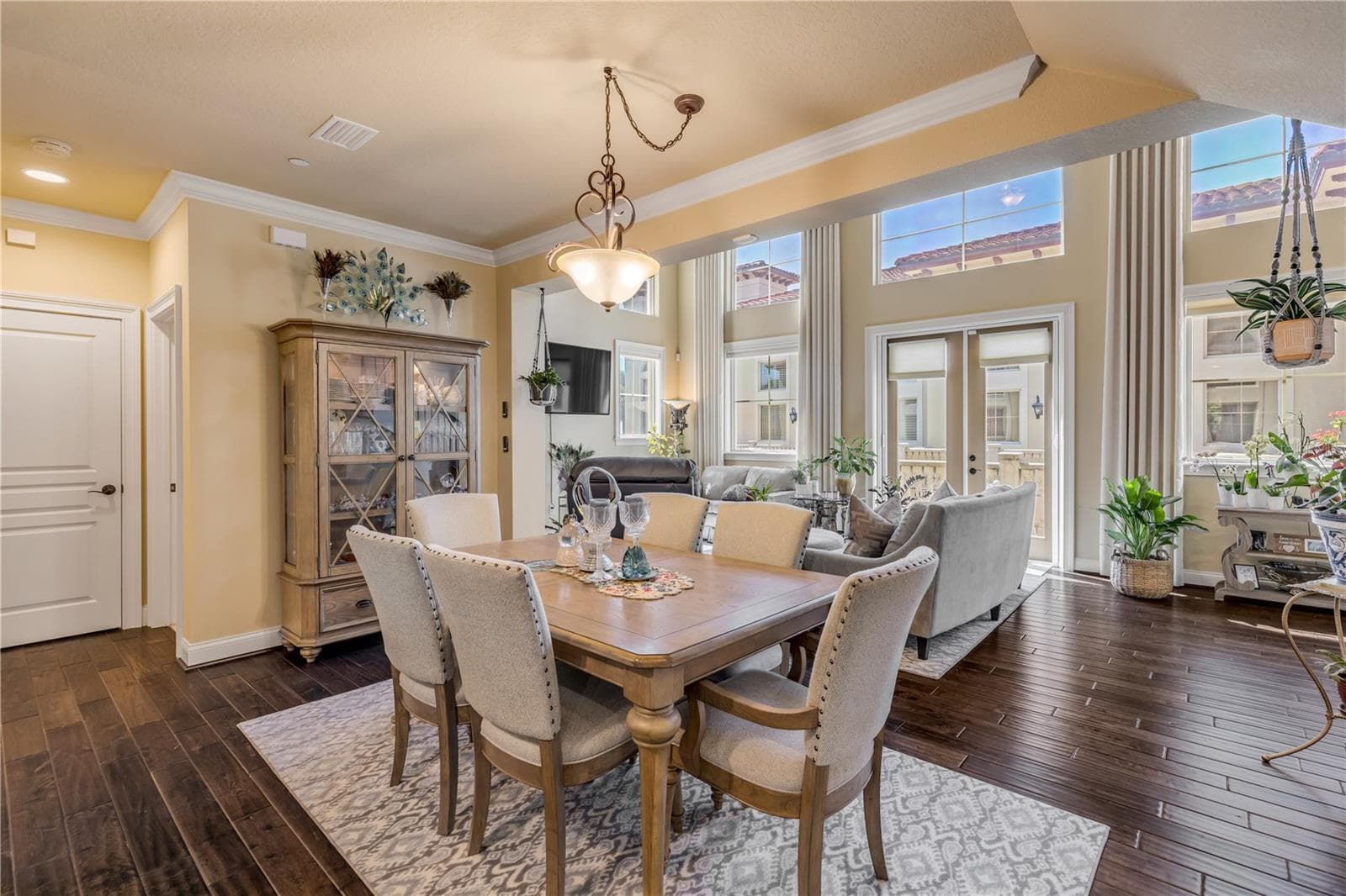 Hardwood floors, natural light, and crown molding. - 5090 RIVERSIDE DR #105, PORT ORANGE