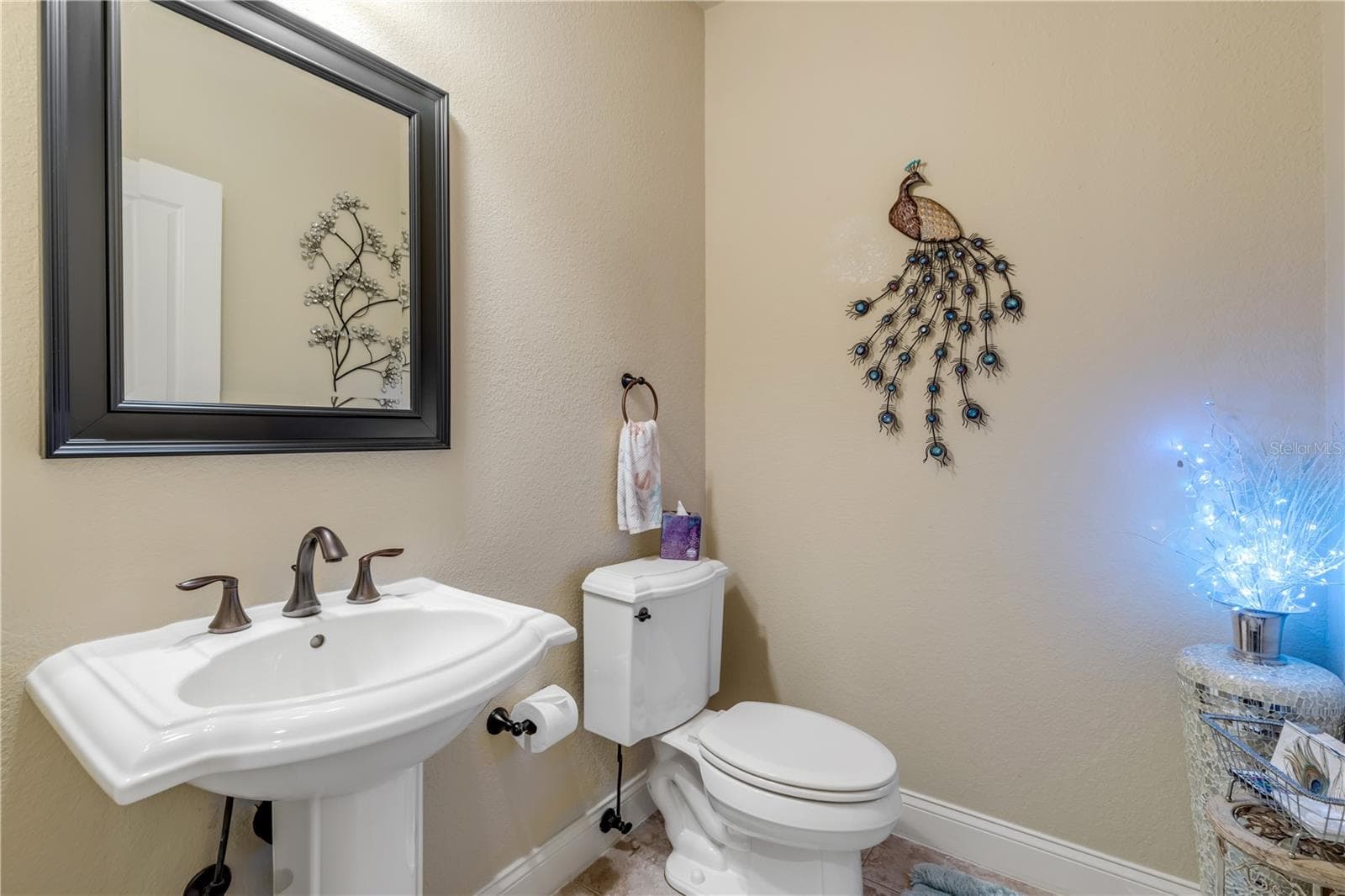powder room on main level for guests - 5090 RIVERSIDE DR #105, PORT ORANGE