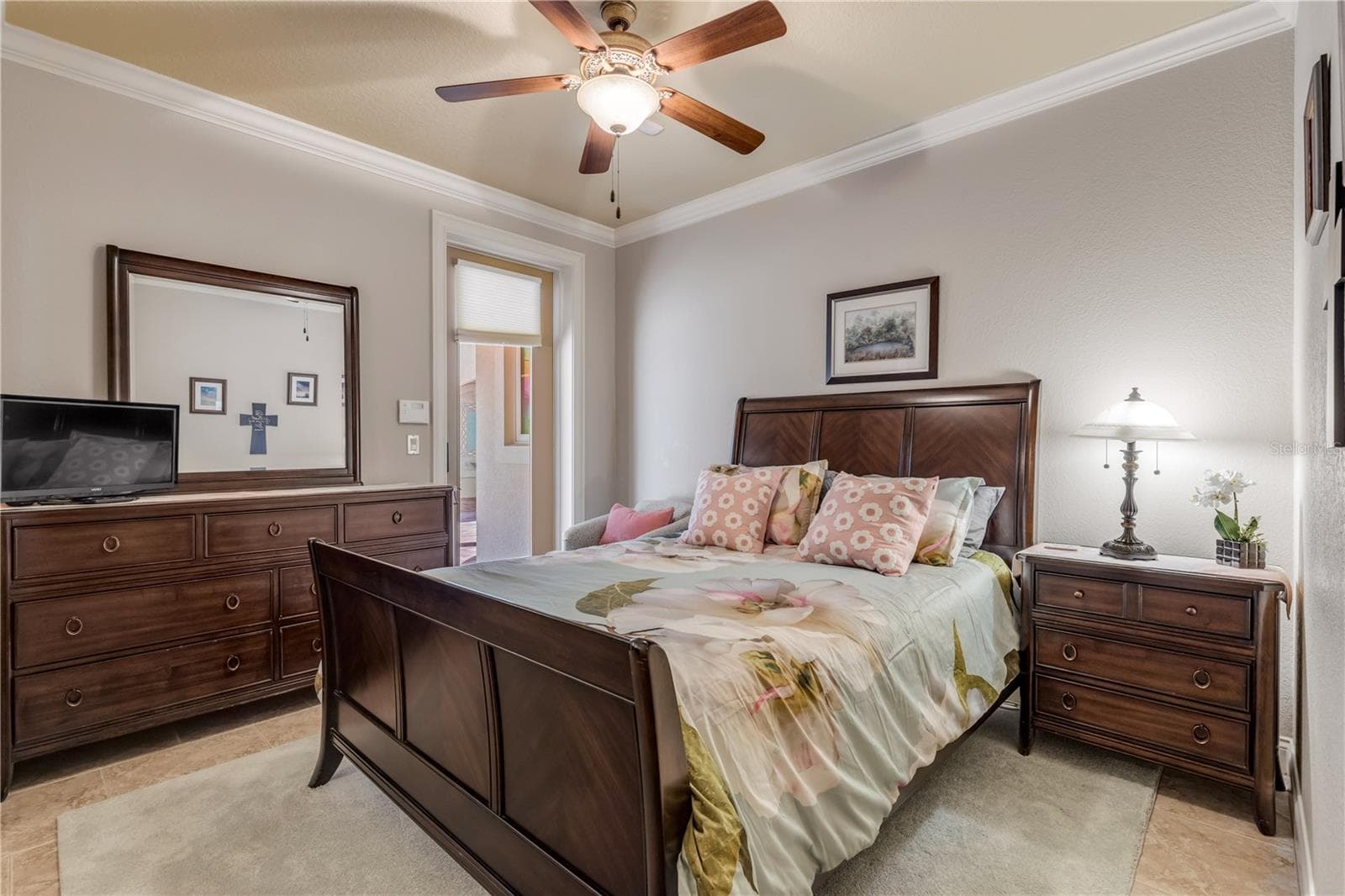 Guest BedroomExterior door to ground level pool area - 5090 RIVERSIDE DR #105, PORT ORANGE