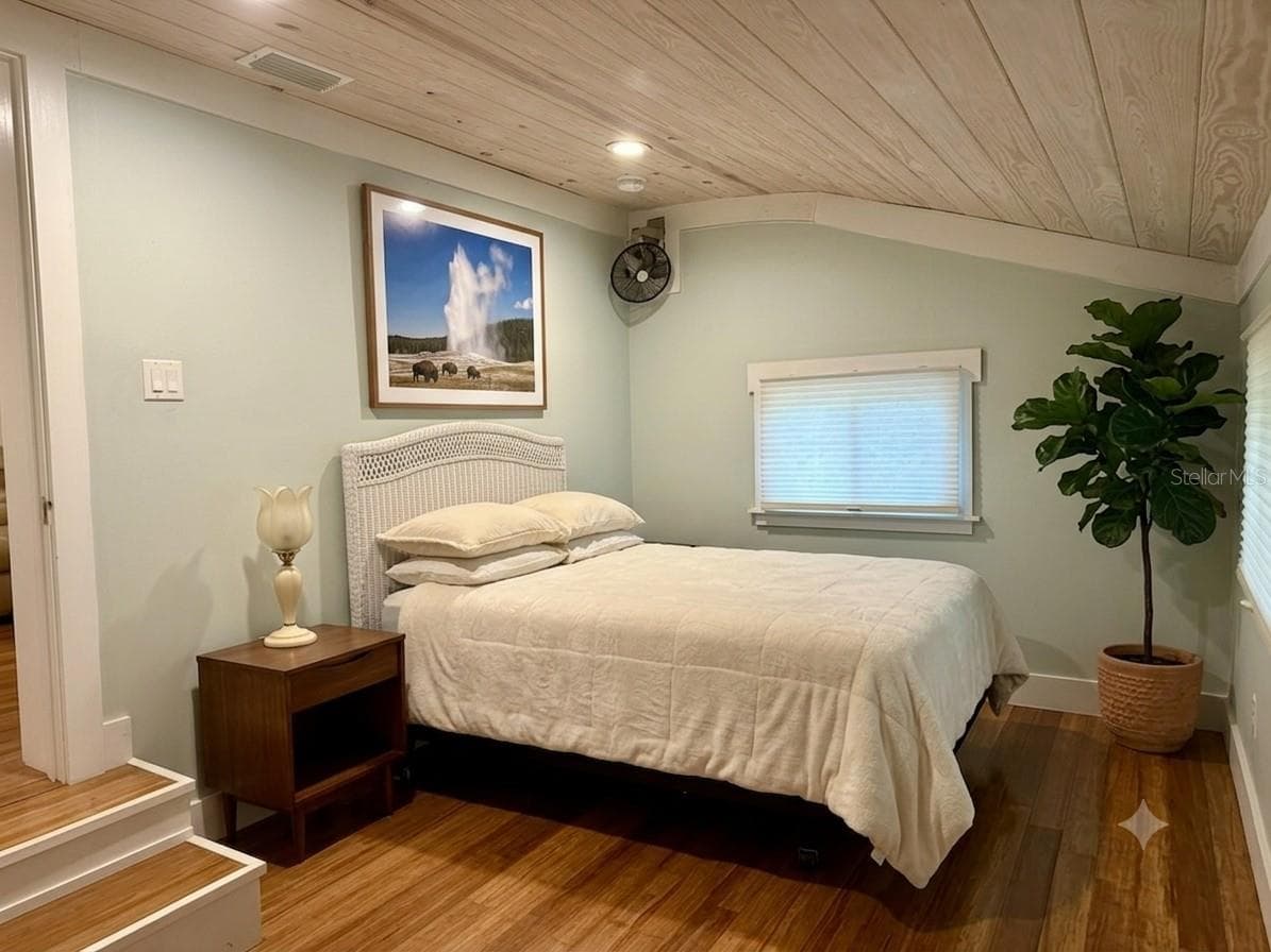 SECONDARY BEDROOMVITUALLY STAGED - 301 E KENTUCKY AVE, DELAND