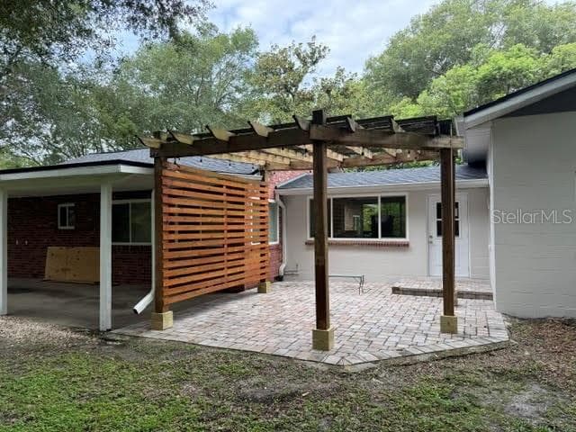 SIDE PAVER DECKWITH PERGOLA - 301 E KENTUCKY AVE, DELAND