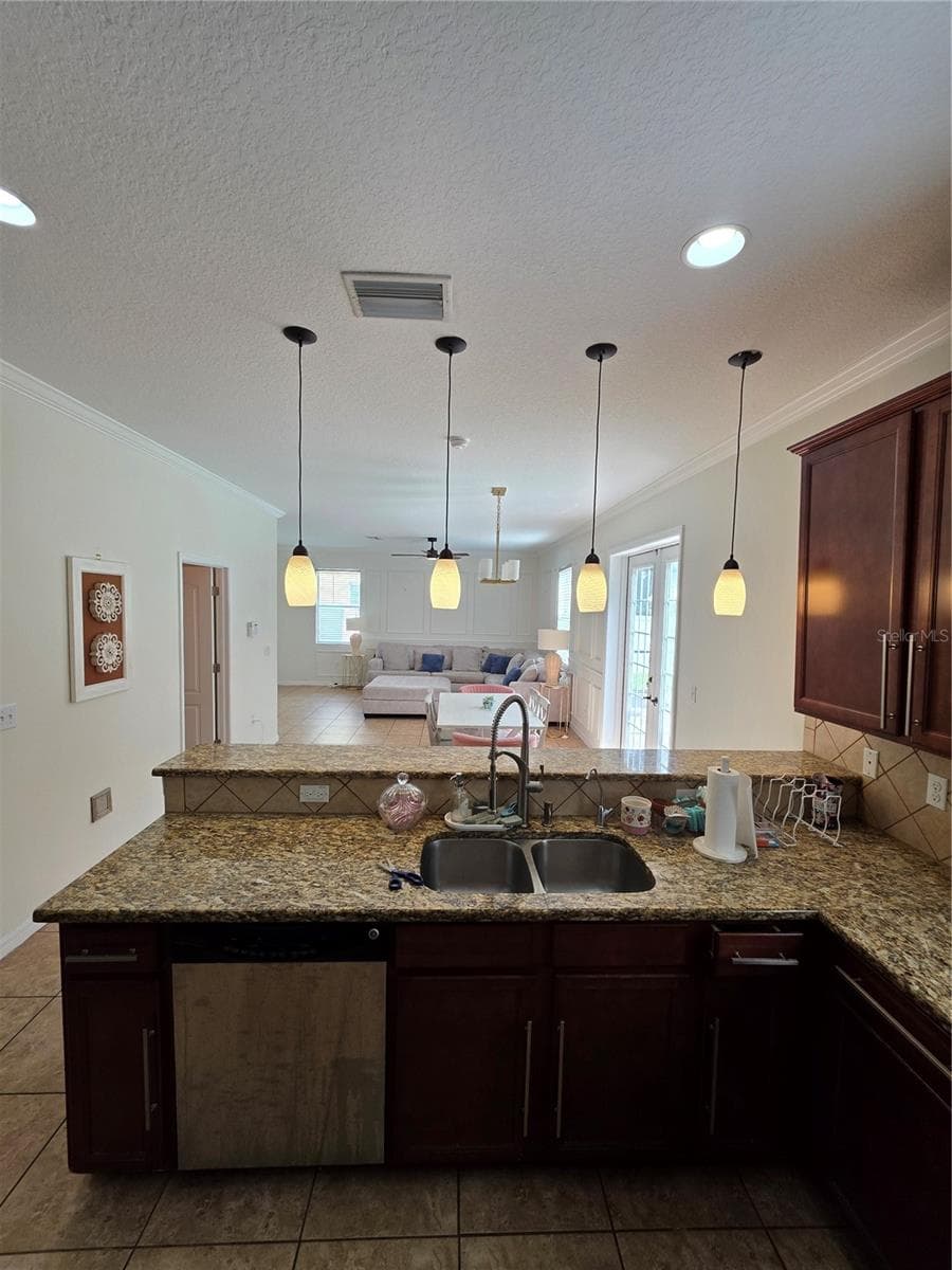 Kitchen view of living room. - 2623 HOLLY BLUFF CT, PLANT CITY