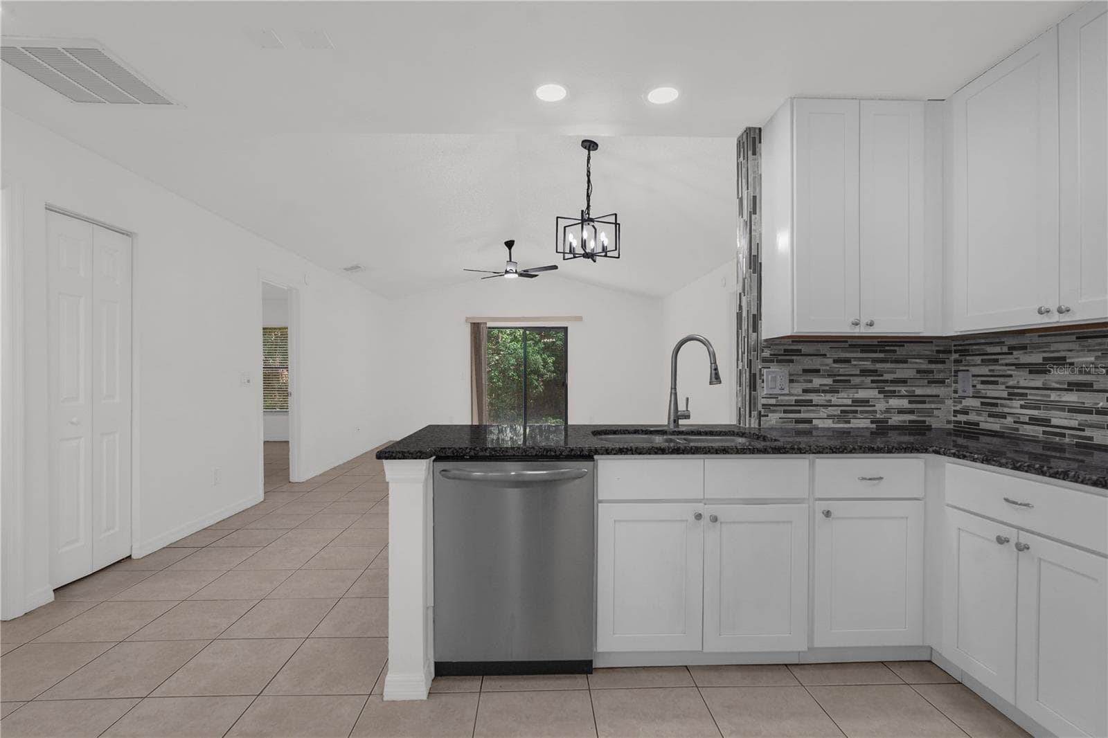 Beautifully updated kitchen with stainless steel appliances. - 1455 ELDRA DR, KISSIMMEE