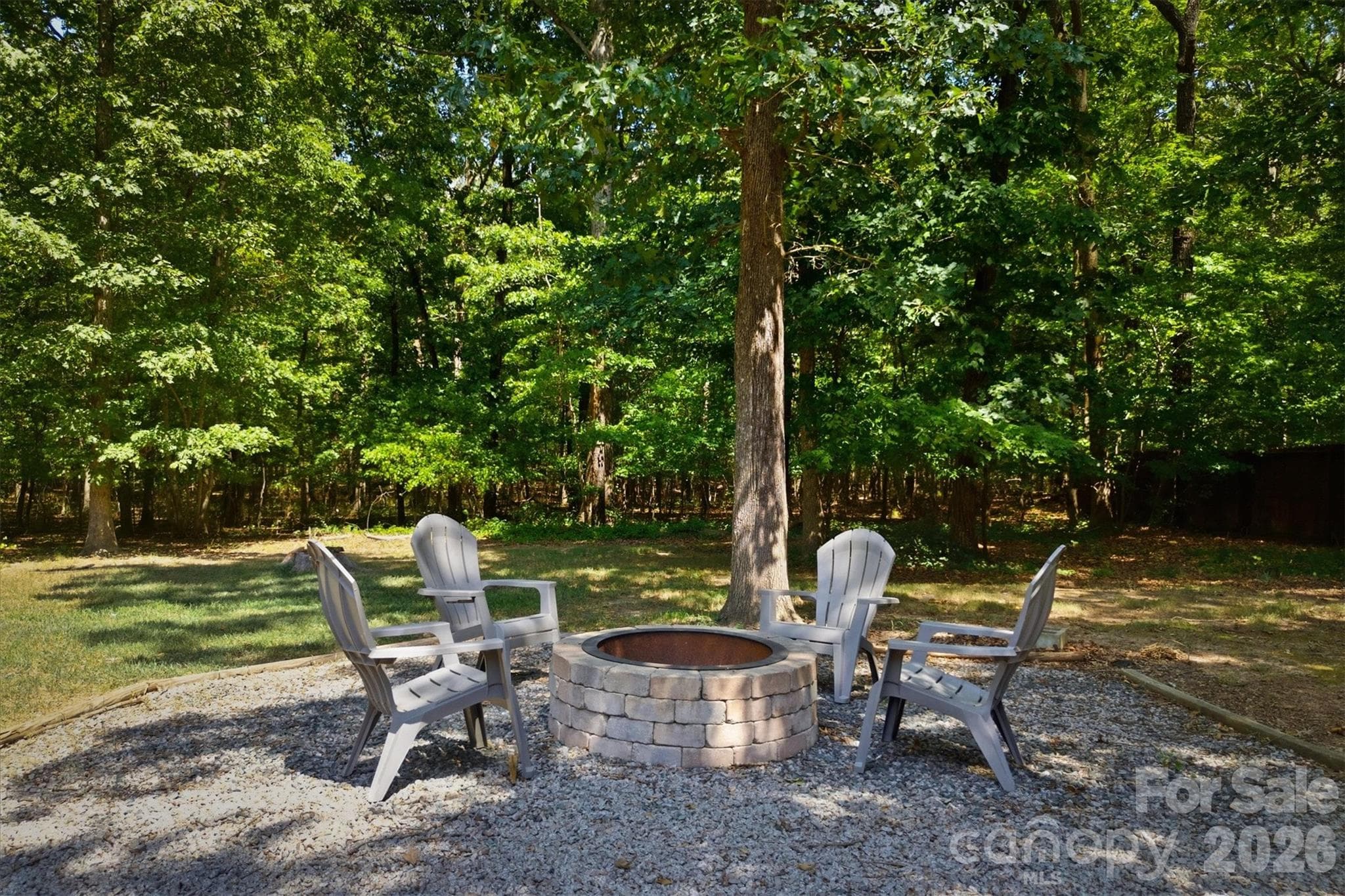 Firepit with woodedbackyard - 802 White Oaks Circle, Monroe