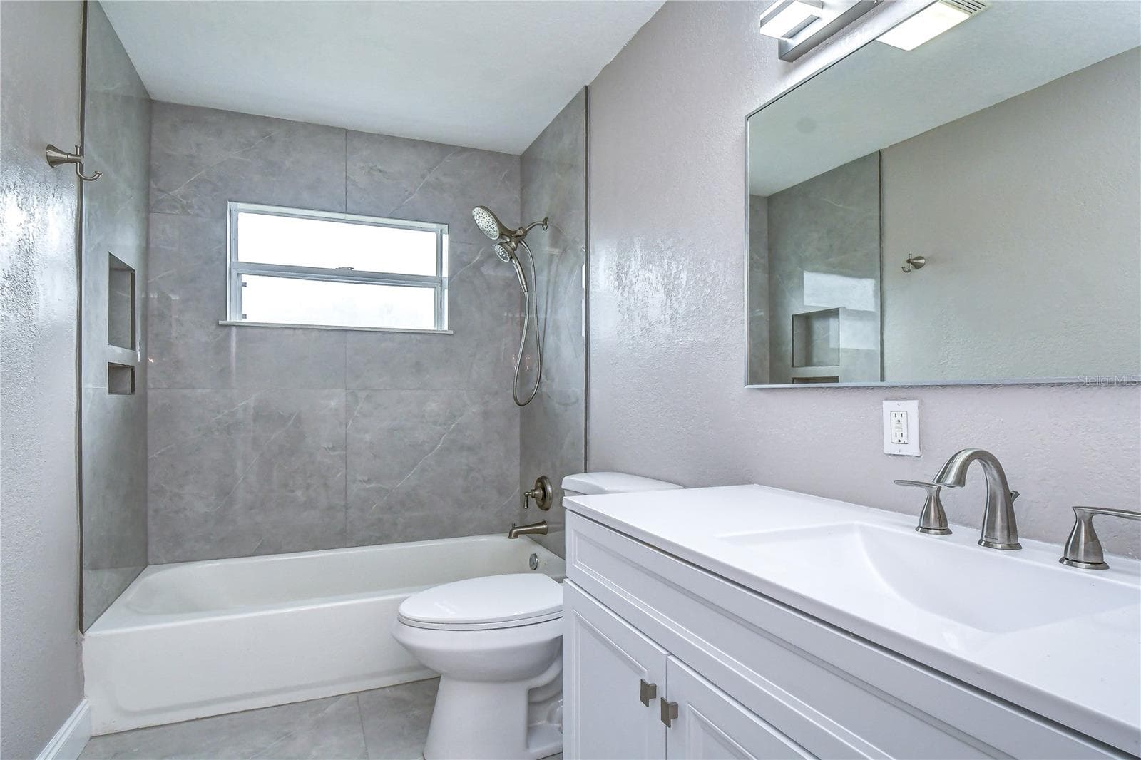 guest bathroom - 6871 4TH ST S, ST PETERSBURG