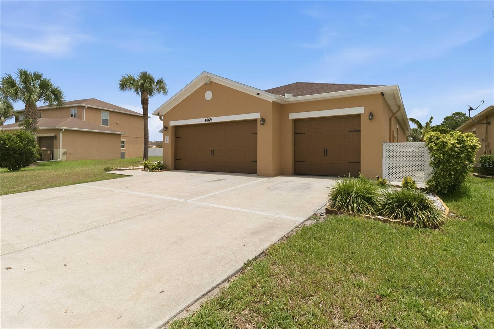 3 car garage, large driveway, fully fenced - 4069 MARINA ISLE DR, KISSIMMEE