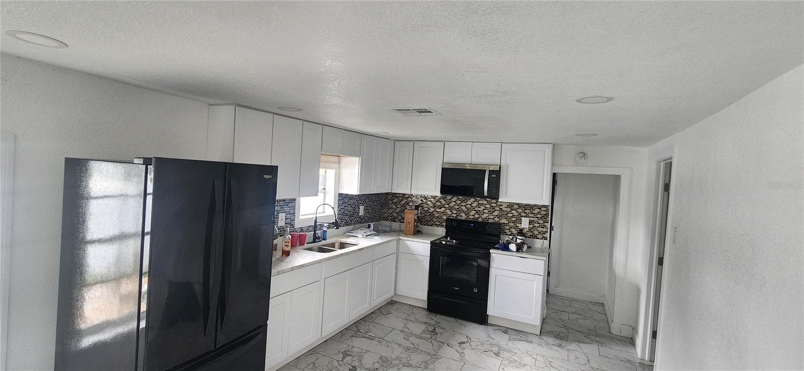 Single Family Residence at 3004 E DR MARTIN LUTHER KING JR BLVD, TAMPA, photo 2 of 11
