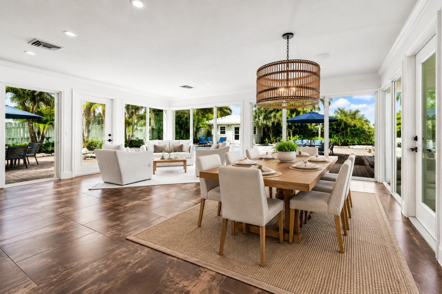 This is the only photo virtually staged. Dining room table, area rug and chairs virtually staged. - 550 N GULF BLVD, PLACIDA