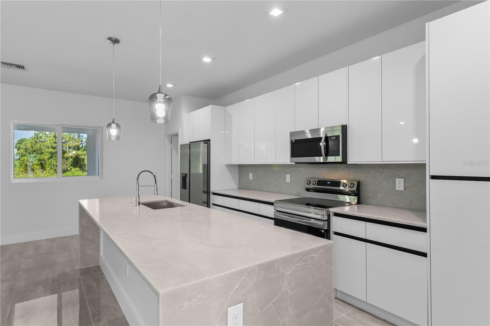 Single Family Residence at 828 GENOA AVE S, LEHIGH ACRES, photo 11 of 56